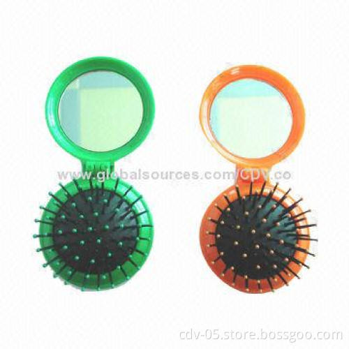 Cosmetic mirror with comb and plastic cap